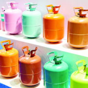 Metal,Colored,Refrigerant,Tanks,On,Display,In,A,Store